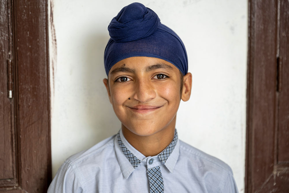 Anmolpreet smiling after cleft surgery