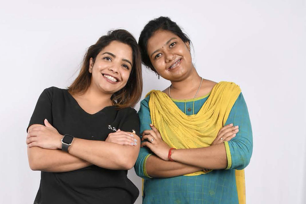 Dr. Shruti smiling with a patient