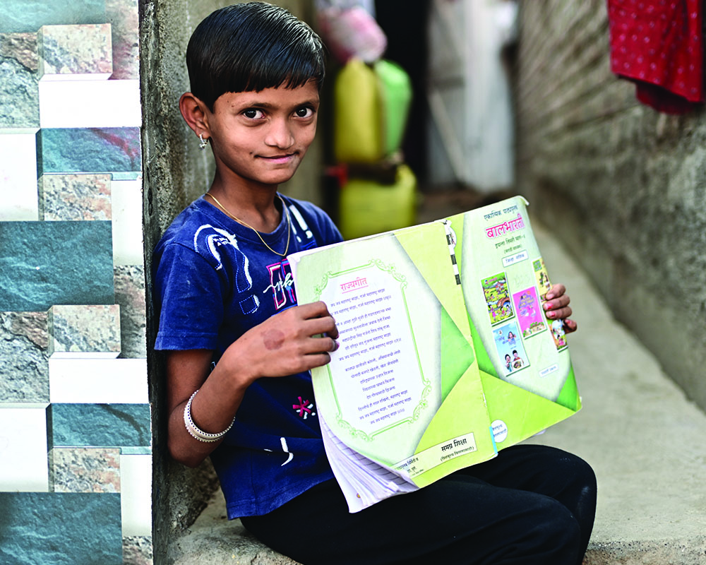 A studious child who dreams of becoming a teacher
