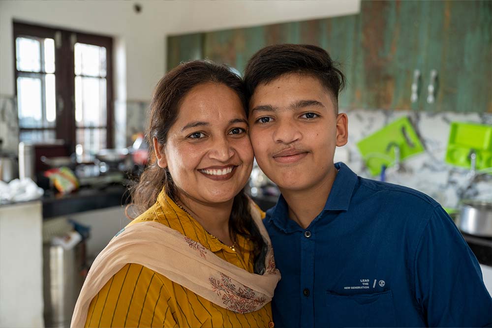 Swastik smiling with his mother Reena after cleft surgery