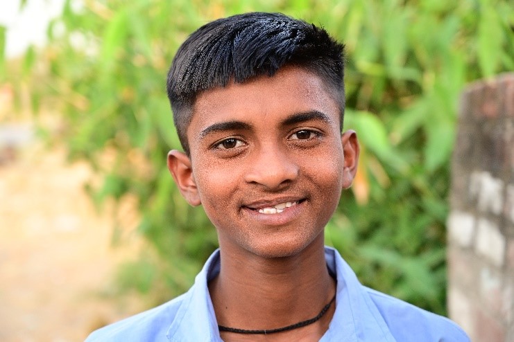 Monu smiling after cleft surgery