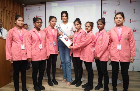 Harnaaz Sandhu smiling with nurses