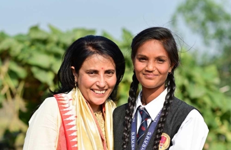 Mamta Carrol smiling and hugging Pinki