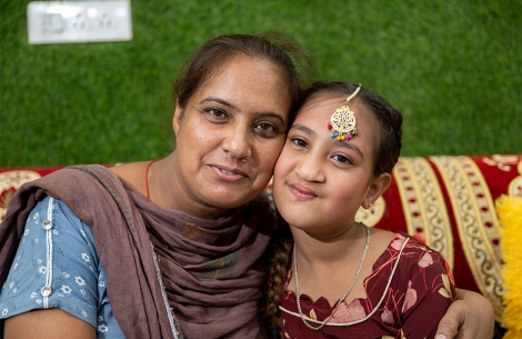 Bhumika smiling with her mother Jyoti after cleft surgery