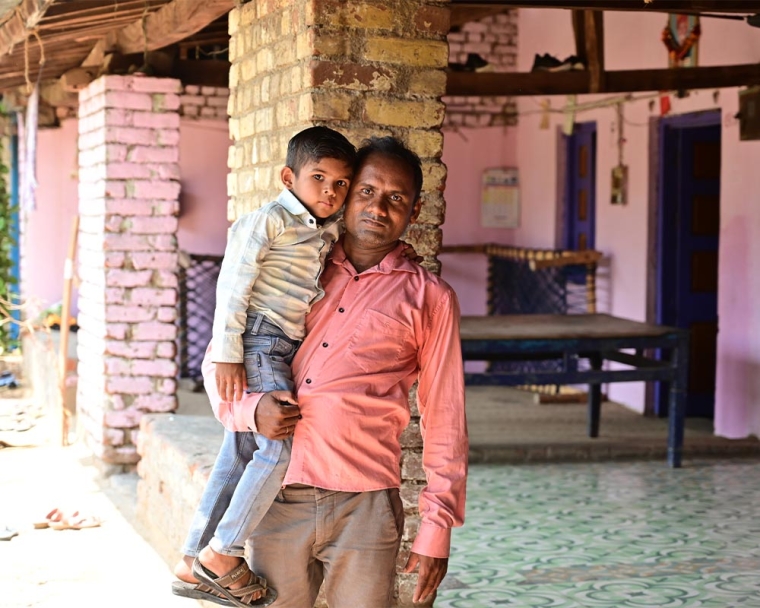 Jairaj smiling with his father after cleft surgery