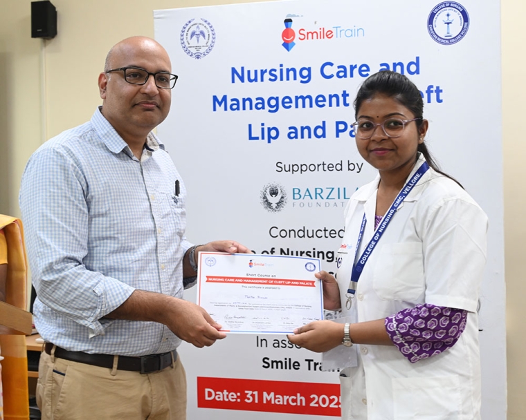Student nurse receiving a certificate