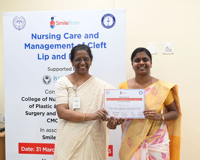 Student nurse receiving a certificate